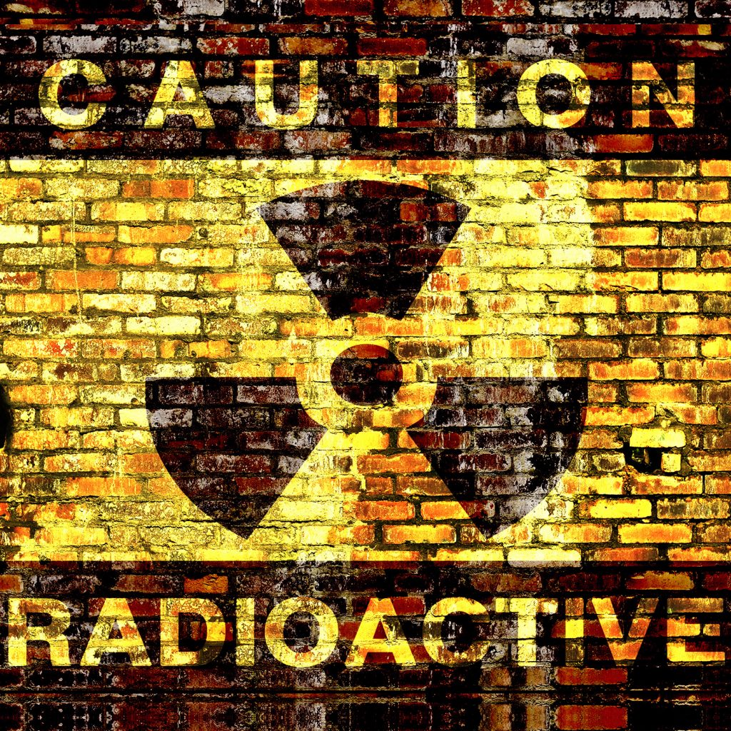 CAUTION - RADIOACTIVE SIGN PAINTED ON WALL